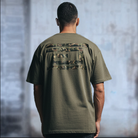 Drumcode camo print oversized unisex t shirt in olive-Drumcode-Essential Republik