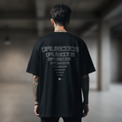 Drumcode outline print oversized unisex t shirt in black-Drumcode-Essential Republik